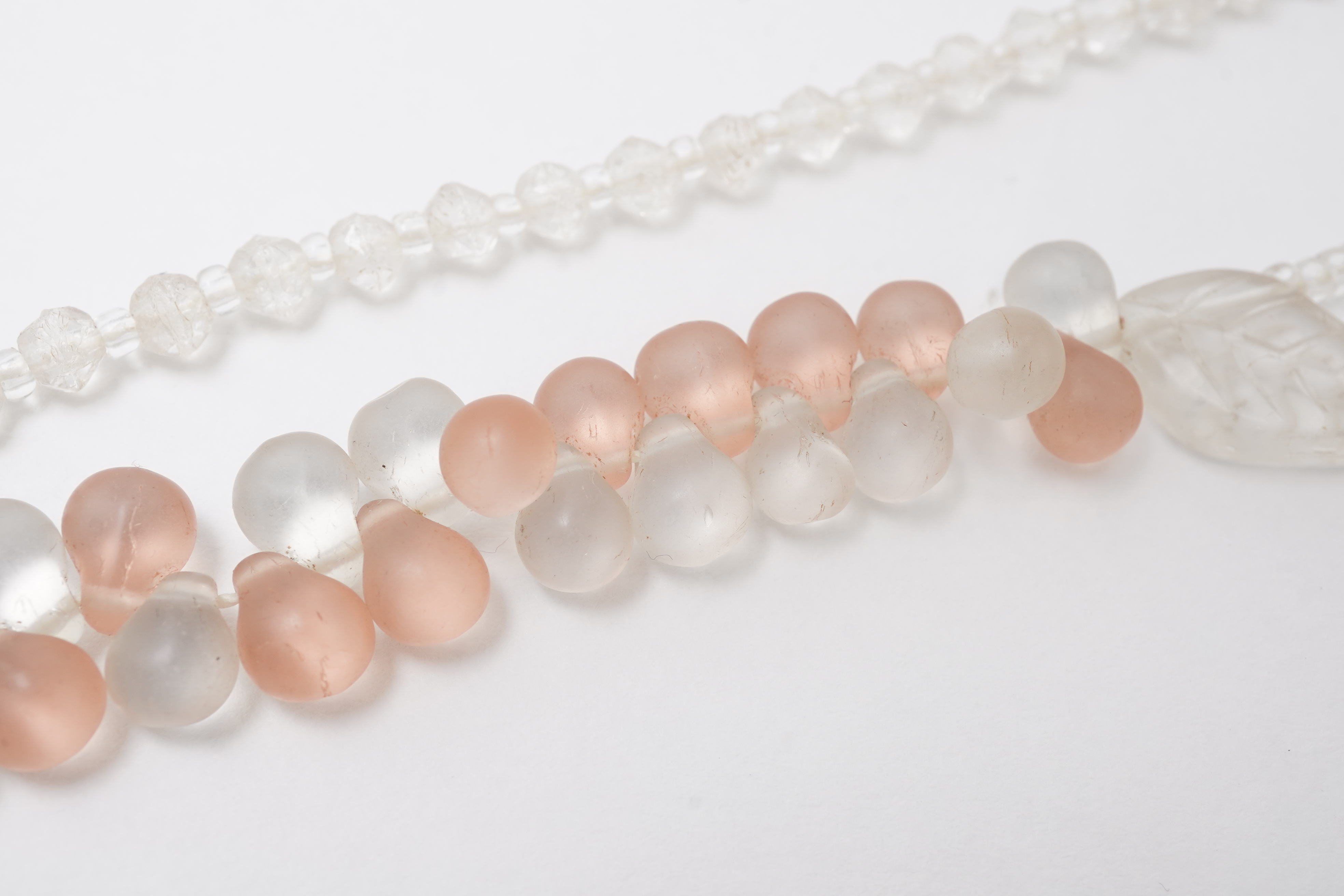 A collection of jewels and accessories including a moonstone bracelet